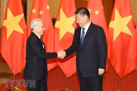 越共中央总书记阮富仲与中共中央总书记、国家主席习近平互致新春贺信