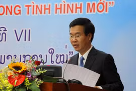 越南共产党与老挝人民革命党第七次理论研讨会开幕