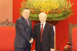 越共中央总书记阮富仲会见中共中央对外联络部部长刘建超