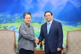 越南政府总理范明政会见联合国副秘书长兼亚太经社会执行秘书阿里沙赫巴纳