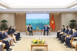 越南政府总理范明政会见泰国副总理兼外长班比·帕西塔努功