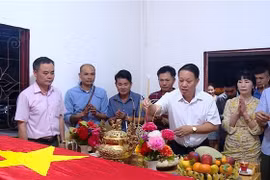 旅居老挝乌多姆塞省越南人缅怀援老烈士功绩