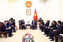 越南政府副总理黎明慨会见韩国国家农业合作社联合会主席