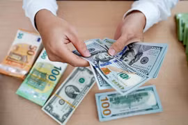 9月14日上午越南国内市场越盾对美元汇率中间价下调32越盾