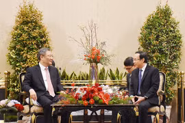 胡志明市委书记阮文年会见中国商务部部长王文涛