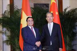 越南政府总理范明政会见中国全国人大委会长赵乐际