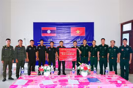 越老两国加强合作 共建和平友谊的边界线