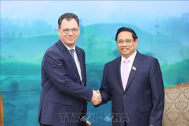 越南政府总理范明政会见罗马尼亚经济、创业和旅游部长斯特凡·拉杜·奥普雷亚