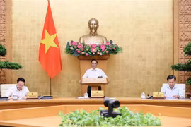 越南政府总理范明政主持7月份政府立法工作专题会议