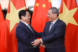 越南政府总理范明政与中国国务院总理李强举行会谈