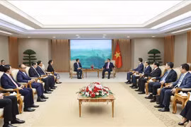 越南政府总理范明政会见老挝副总理兼外交部长