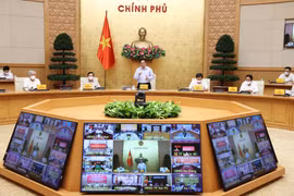 越南政府总理范明政主持召开全国新冠肺炎疫情防控工作视频会议