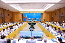 会议场景。图自越通社