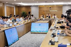 会议场景。图自越通社