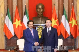 越南国家主席陈大光（右）亲切会见科威特首相谢赫•贾比尔•穆巴拉克•哈马德•萨巴赫。