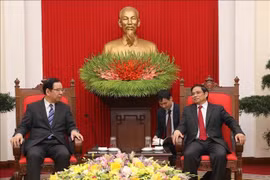 越共中央组织部部长范明正会见日本共产党中央委员会主席