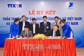越通社与越南邮政通信集团签署合作协议