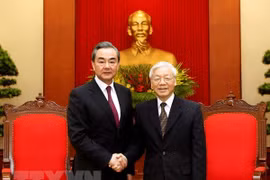 越共中央总书记阮富仲会见中国国务委员兼外交部长王毅