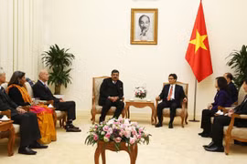 越南政府副总理武德儋会见国际SOS儿童村组织主席悉达多•考尔