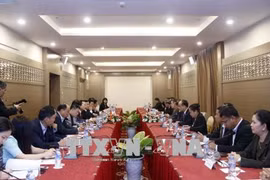 越南与老挝力争建设按时保质的老挝国会大厦工程