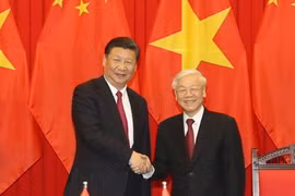 越中领导人互致贺电庆祝两国建交68周年