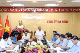 阮春福：河南省应做到工业化现代化与新农村建设两手抓