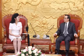 越共中央对外部部长黄平君会见朝鲜社会主义妇女同盟代表团