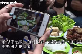 沙蚕煎饼——首都河内独具一格的美食