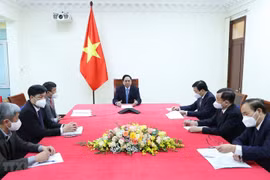 越南政府总理范明政同中国国务院总理李克强通电话