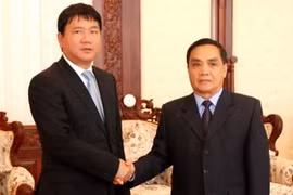 老挝总理通辛·坦马冯会见交通运输部部长丁罗升