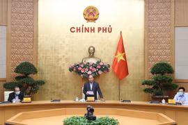 阮春福总理：上下一心、团结一致使疫情防控工作得以更快速、更高效进展