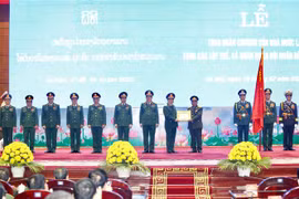 越南和老挝两国国家勋章授勋仪式在河内隆重举行