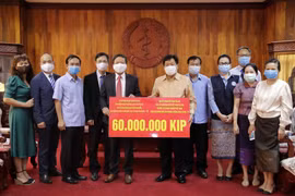 老挝卫生部部长： 不管遇到任何困难越南都与老挝人民共同分担困难