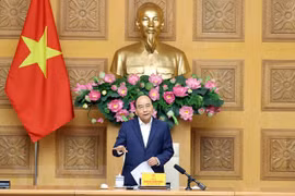 政府总理阮春福会见纺织品服装和皮革鞋类企业代表