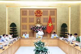 越南政府总理主持会议 为石油和航空企业化解困难