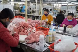 鞋类制造加工环节。图自越通社