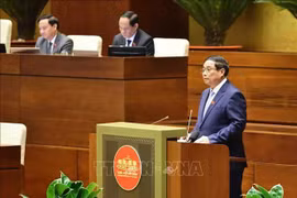 越南政府总理范明政在会议上发言。图自越通社