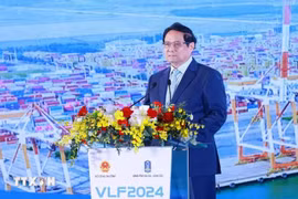 越南政府总理范明政发表讲话。图自越通社