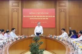 会议场景。图自越通社
