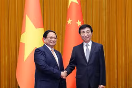  越南政府总理范明政会见中国全国政协主席王沪宁。图自越通社