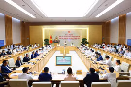 会议场景。图自越通社