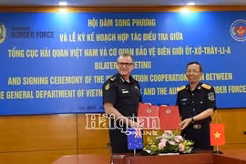 调查合作计划签字仪式。图自越通社