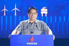 政府总理范明政发表讲话。图自越通社