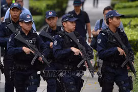 马来西亚警察局遇袭后新加坡强化安全保障。图自AFP