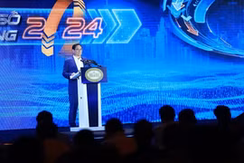 越南政府总理范明政发表讲话。图自越通社