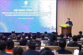 越南政府总理范明政发表讲话。图自越通社