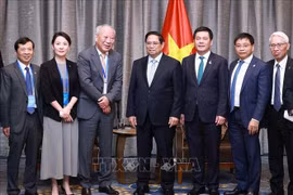 范明政总理已会见中国太平洋建设集团创始人、庄严智库理事长严介和。图自越通社