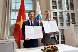 签字仪式。图自越通社