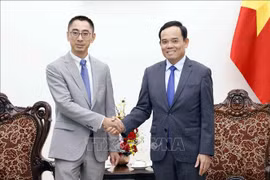 越南政府副总理陈流光会见华为公司副总裁。图自越通社