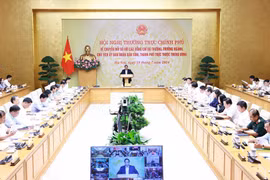 越南政府总理范明政主持召开数字化转型会议。图自越通社